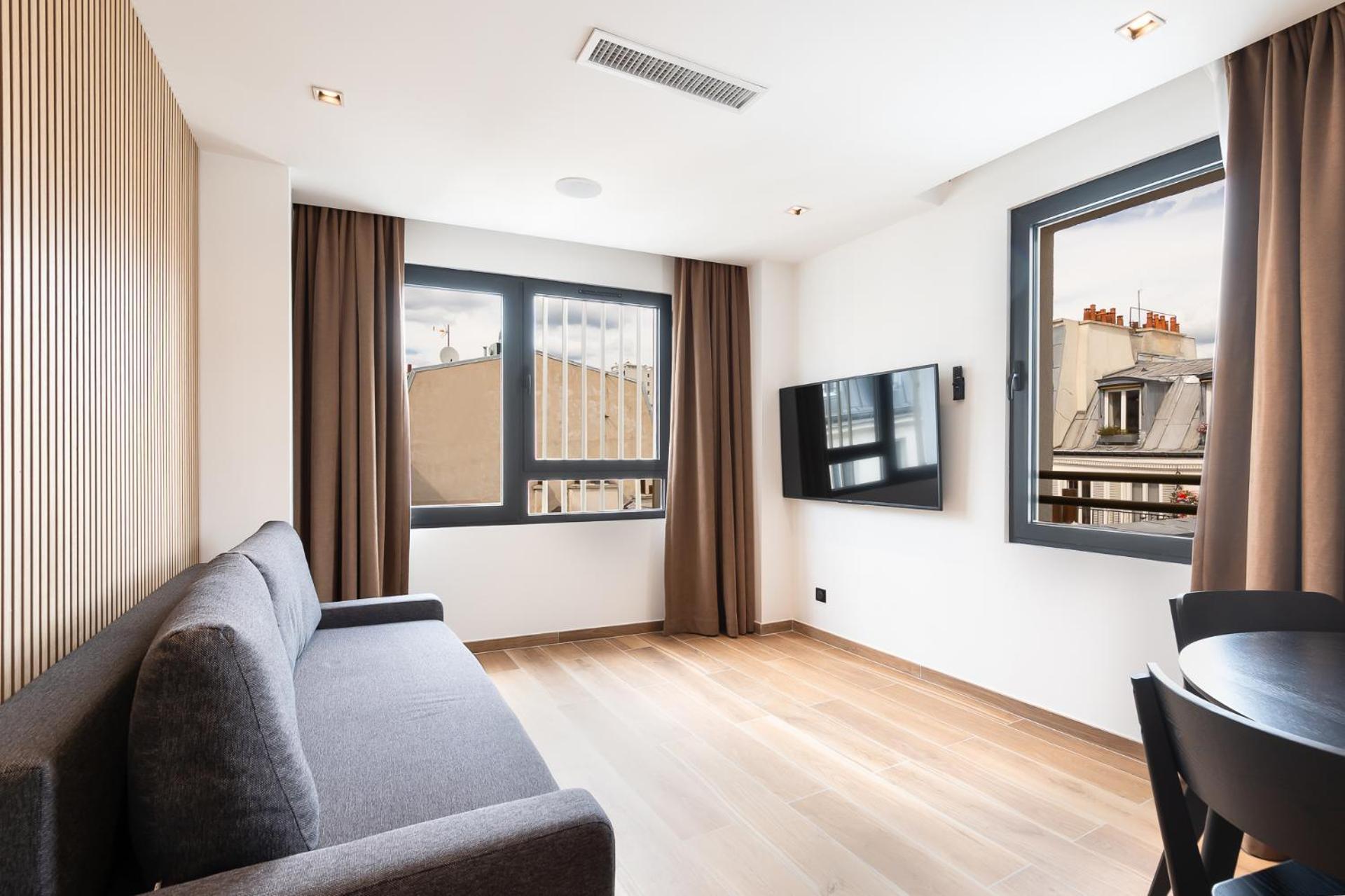 Les Suites Hcr Paris Exterior foto